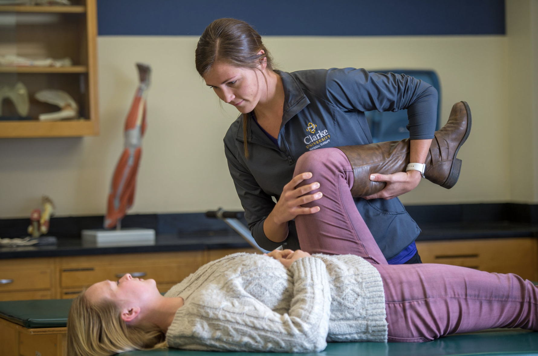 Clarke University exercise science major performs a fitness assessment.