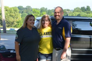 Clarke student with parents