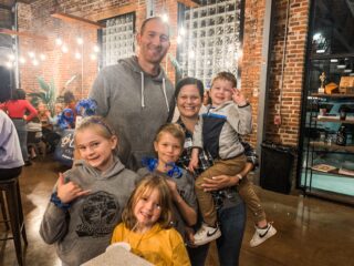 Alumna Julie Cirks with her husband alumnus Grant Cirks, and their four children.