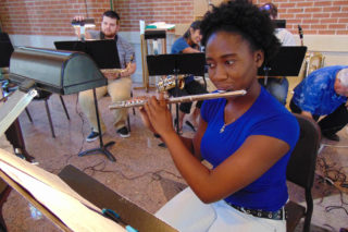 Clarke University Music Major Students Performing in a Band