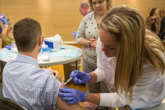 Clarke student providing health services