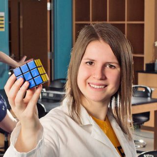 Science student with Rubik's Cube